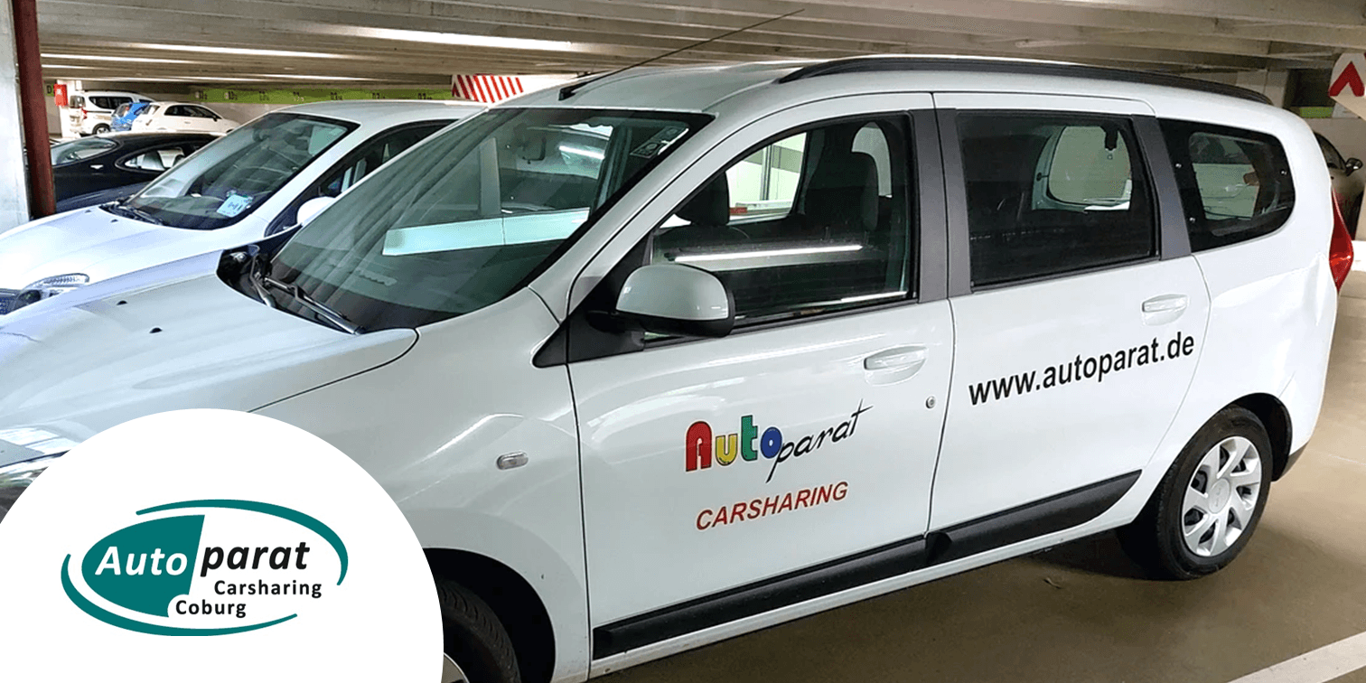 weißes Carsharing-Fahrzeug im Parkhaus des Carsahrin-Partners Autoparat copyright Autoparat e.V.